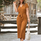 Blauwe jumpsuit met knoopsluiting en ceintuur - Emma